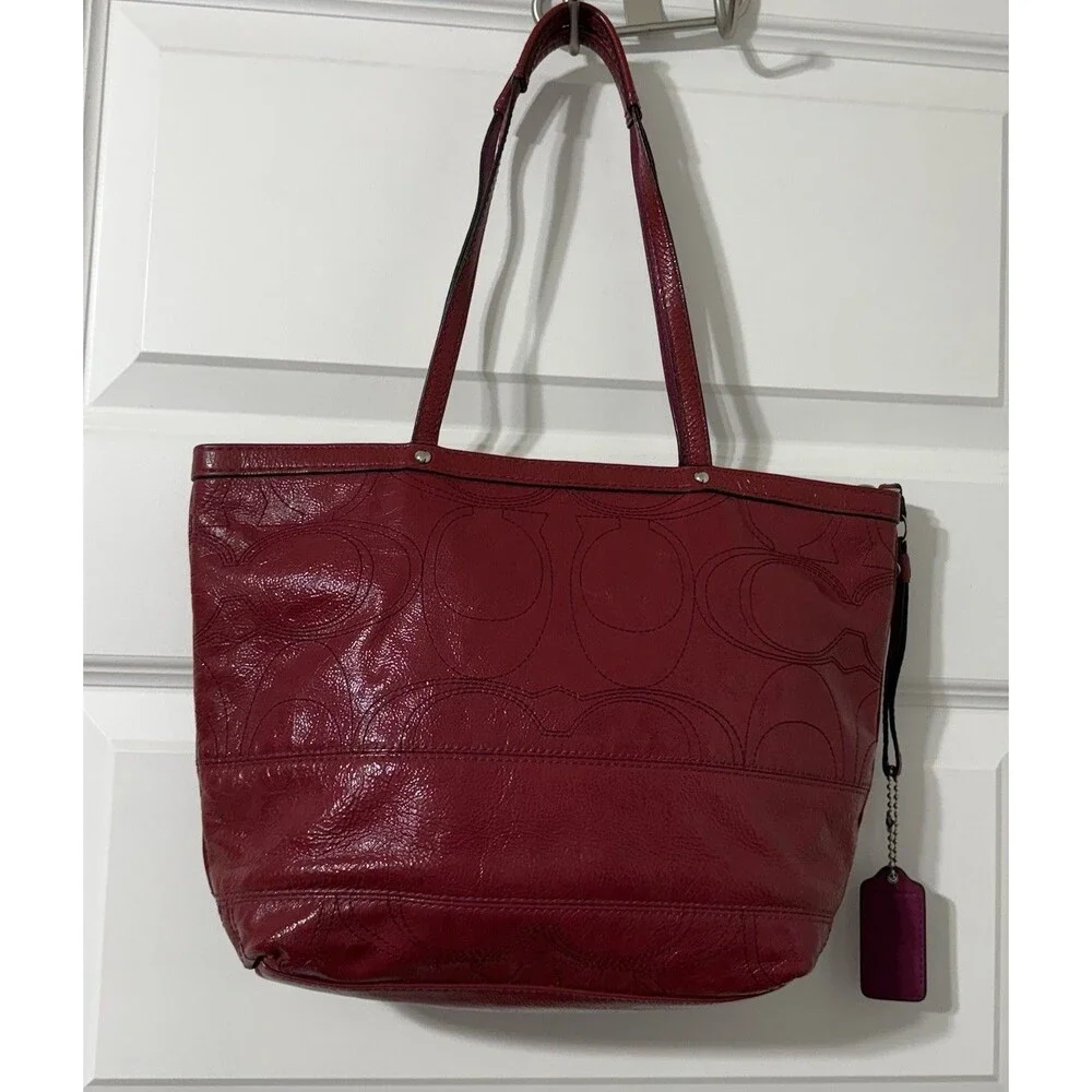 Coach Berry Pink Patent Leather Stitched C Signature Stripe Shoulder Bag.